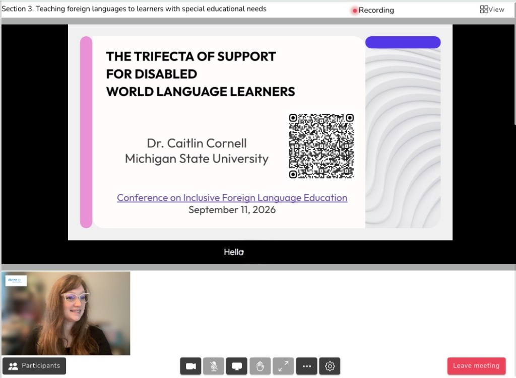 A screenshot of the virtual conference platform showing Caitlin on camera and her title slide shared on her screen.
